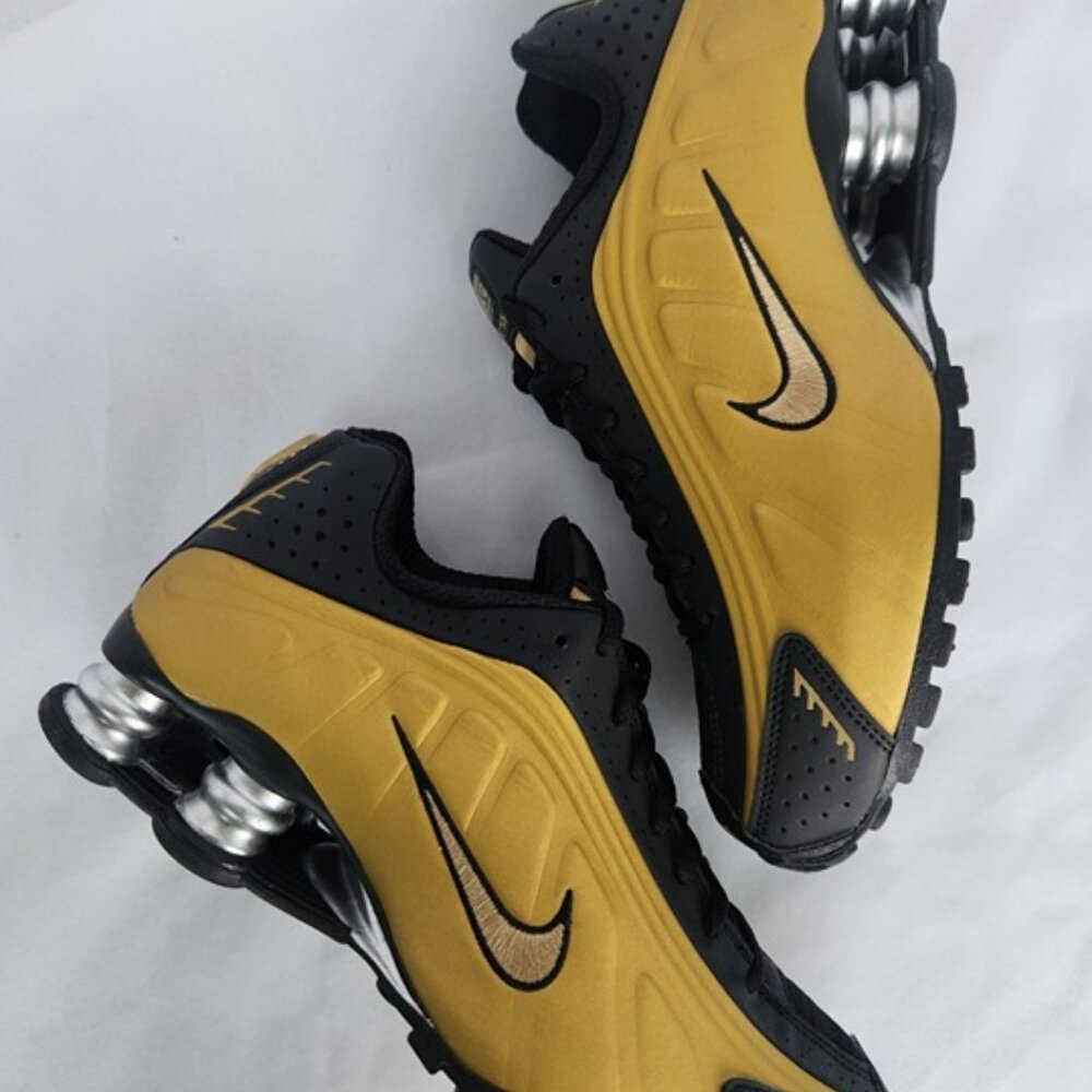 Nike Shox Gold and Black Athletic Sneakers
